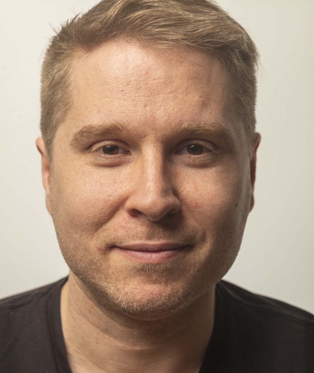 Liam Martin, smiling, probably about to say something about meetings